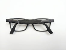 Tommy Hilfiger Glasses on wooden surface